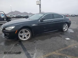 2013 BMW 6 Series 650i with VIN WBA6B2C50DD128323, listed as a Copart auction lot 43059985 with 106,861 mi miles and Clean Title. Bid and sale history available at carsss.com. Image 1.