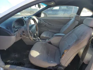 1997 Ford Mustang with VIN 1FALP4043VF174092, listed as a Copart auction lot 86983884 with 105,774 mi miles and Salvage Title. Bid and sale history available at carsss.com. Image 7.