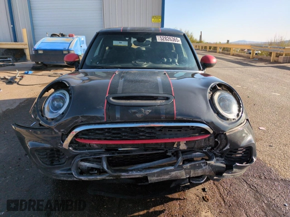 2016 MINI Hardtop John Cooper Works with VIN WMWXM9C50GT997764, listed as a Copart auction lot 52826365 with 82,430 mi miles and Salvage title. Bid and sale history available at DreamBid. Image 5.