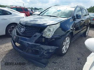 2014 Cadillac SRX Performance Collection with VIN 3GYFNCE39ES613051, listed as a IAAI auction lot 42113063 with 82,952 mi miles and . Bid and sale history available at carsss.com. Image 2.