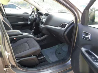 2013 Dodge Journey SE z VIN 3C4PDCAB5DT518019, wystawiony jako IAAI lot #42409340 z przebiegiem 174 339 mil mil oraz . Historia ofert i sprzedaży dostępna na DreamBid. Obrazek 5.