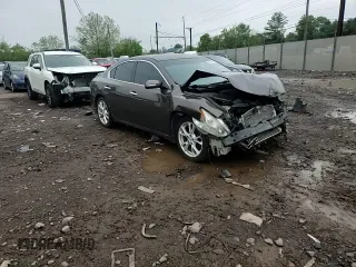 2014 Nissan Maxima SV z VIN 1N4AA5AP6EC439208, wystawiony jako Copart lot #55628955 z przebiegiem 167 773 mil mil oraz Szkoda całkowita • Salvage title. Historia ofert i sprzedaży dostępna na DreamBid. Obrazek 13.