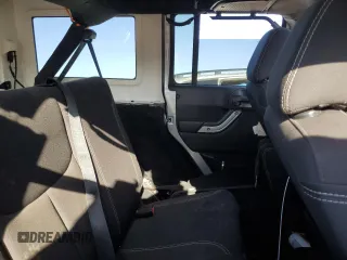 2015 Jeep Wrangler Unlimited Sahara z VIN 1C4BJWEG1FL617428, wystawiony jako Copart lot #55850005 z przebiegiem Nie podano mil oraz Szkoda całkowita • Salvage title. Historia ofert i sprzedaży dostępna na DreamBid. Obrazek 10.