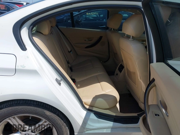 2014 BMW 3 Series 328i with VIN WBA3A5C5XEP602723, listed as a IAAI auction lot 42380748 with 127,492 mi miles and . Bid and sale history available at DreamBid. Image 8.