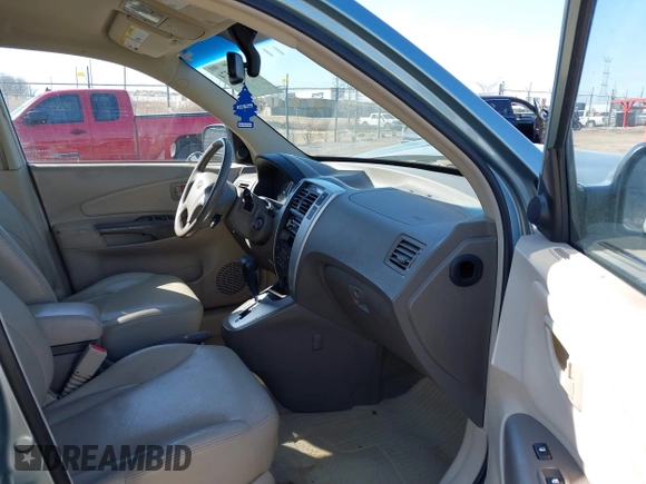 2006 Hyundai Tucson GLS with VIN KM8JN12D76U370922, listed as a IAAI auction lot 41800574 with 133,247 mi miles. Bid and sale history available at carsss.com. Image 5.