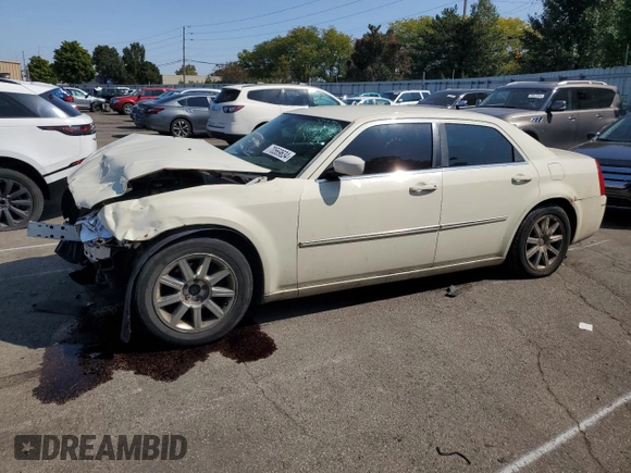 2009 Chrysler 300 Touring with VIN 2C3LA53V69H553621, listed as a Copart auction lot 70569634 with 141,157 mi miles and Salvage Title. Bid and sale history available at carsss.com. Image 1.