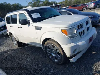 2007 Dodge Nitro R/T with VIN 1D8GU58647W656977, listed as a IAAI auction lot 41508811 with 286,570 mi miles. Bid and sale history available at carsss.com. Image 1.