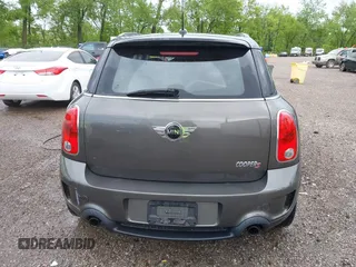 2011 MINI Countryman S with VIN WMWZC5C53BWM11022, listed as a IAAI auction lot 42249403 with 173,718 mi miles and . Bid and sale history available at DreamBid. Image 16.