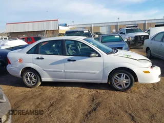 2004 Ford Focus SE with VIN 1FAFP34324W137459, listed as a IAAI auction lot 41634502 with 134,113 mi miles and . Bid and sale history available at DreamBid. Image 13.