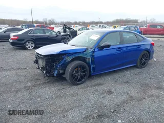 2022 Honda Civic Sport z VIN 2HGFE2F50NH503994, wystawiony jako IAAI lot #41870938 z przebiegiem 26 666 mil mil oraz . Historia ofert i sprzedaży dostępna na DreamBid. Obrazek 2.