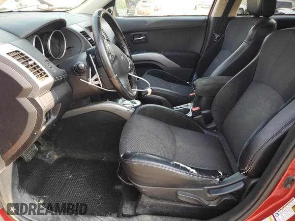 2013 Mitsubishi Outlander SE z VIN JA4JT3AW7DU001736, wystawiony jako Copart lot #59701515 z przebiegiem 121 929 mil mil oraz Szkoda całkowita • Salvage title. Historia ofert i sprzedaży dostępna na DreamBid. Obrazek 7.