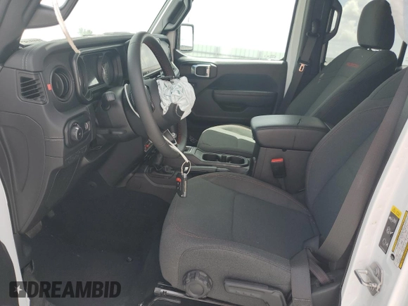 2024 Jeep Wrangler Rubicon z VIN 1C4PJXFG9RW336006, wystawiony jako Copart lot #60237785 z przebiegiem 24 571 mil mil oraz Czysty tytuł • Clean title. Historia ofert i sprzedaży dostępna na DreamBid. Obrazek 7.