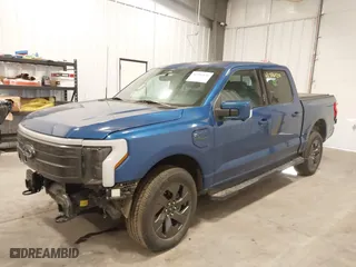 2022 Ford F-150 Lightning Pro with VIN 1FTVW1EL7NWG15923, listed as a IAAI auction lot 41396120 with 25,322 mi miles. Bid and sale history available at carsss.com. Image 2.