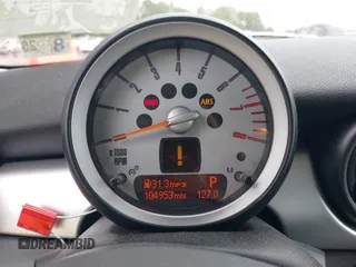 2010 MINI Hardtop S with VIN WMWMF7C55ATW88946, listed as a IAAI auction lot 42443200 with 104,953 mi miles and . Bid and sale history available at DreamBid. Image 7.