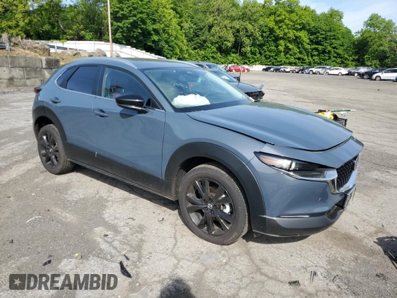 2024 Mazda CX-30 S Carbon Edition with VIN 3MVDMBCM0RM641898, listed as a Copart auction lot 57712225 with 9,185 mi miles and Salvage title. Bid and sale history available at DreamBid. Image 4.