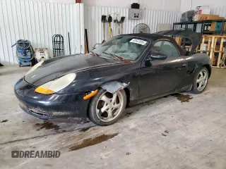 1999 Porsche Boxster z VIN WP0CA2988XU623383, wystawiony jako Copart lot #60567895 z przebiegiem Nie podano mil oraz Czysty tytuł • Clean title. Historia ofert i sprzedaży dostępna na DreamBid. Obrazek 1.