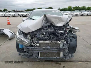 2021 Nissan Versa SV z VIN 3N1CN8EV3ML833899, wystawiony jako Copart lot #55991235 z przebiegiem 65 021 mil mil oraz Szkoda całkowita • Salvage title. Historia ofert i sprzedaży dostępna na DreamBid. Obrazek 5.