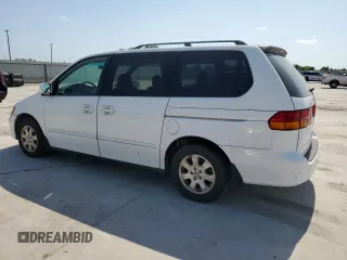 2004 Honda Odyssey EX-L with VIN 5FNRL18974B092979, listed as a Copart auction lot 52429055 with 106,515 mi miles and Clean Title. Bid and sale history available at DreamBid. Image 2.