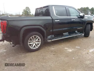 2019 GMC Sierra 1500 SLT z VIN 3GTP8DED5KG283147, wystawiony jako IAAI lot #41545402 z przebiegiem 116 694 mil mil oraz . Historia ofert i sprzedaży dostępna na DreamBid. Obrazek 4.