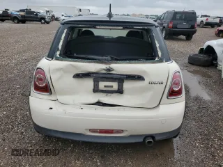 2013 MINI Hardtop z VIN WMWSU3C59DT688460, wystawiony jako Copart lot #55451925 z przebiegiem Nie podano mil oraz Szkoda całkowita • Salvage title. Historia ofert i sprzedaży dostępna na DreamBid. Obrazek 6.