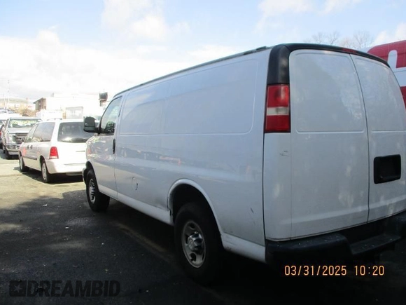 2015 Chevrolet Express Cargo Van with VIN 1GCWGFCF5F1159575, listed as a IAAI auction lot 42040134 with 115,014 mi miles. Bid and sale history available at carsss.com. Image 1.