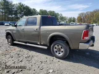 2013 Ram 2500 Laramie with VIN 3C6UR5FL7DG613957, listed as a Copart auction lot 53930035 with 141,953 mi miles and Salvage title. Bid and sale history available at DreamBid. Image 2.