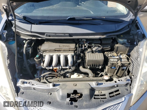 2009 Honda Fit Sport с VIN JHMGE88459S048194, выставлен на аукционе Copart как лот 52581055 с пробегом 177 290 миль миль и Списание • Salvage title. История ставок и продаж доступна на DreamBid. Изображение 11.