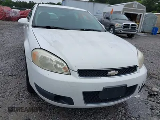2014 Chevrolet Impala Police Police z VIN 2G1WD5E31E1172055, wystawiony jako IAAI lot #42371421 z przebiegiem 94 079 mil mil oraz . Historia ofert i sprzedaży dostępna na DreamBid. Obrazek 6.