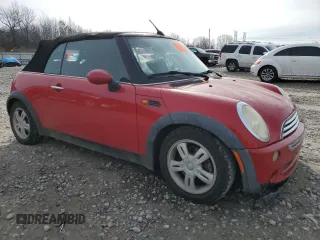 2005 MINI Convertible with VIN WMWRF33525TG12494, listed as a Copart auction lot 43010175 with Not provided miles and Salvage title. Bid and sale history available at DreamBid. Image 4.