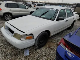 2001 Ford Crown Victoria Police Police Interceptor with VIN 2FAFP71W01X165220, listed as a Copart auction lot 43380784 with 155,877 mi miles and Salvage Title. Bid and sale history available at carsss.com. Image 1.