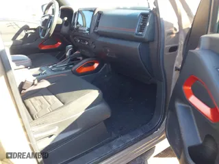 2024 Nissan Frontier PRO-4X with VIN 1N6ED1EK0RN645979, listed as a IAAI auction lot 41613465 with 19,241 mi miles. Bid and sale history available at carsss.com. Image 5.