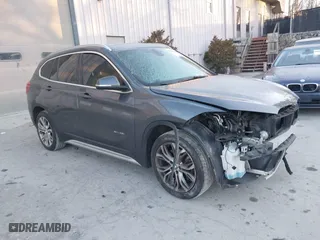 2017 BMW X1 xDrive28i with VIN WBXHT3C33H5F87591, listed as a IAAI auction lot 41256899 with 69,362 mi miles. Bid and sale history available at carsss.com. Image 1.