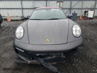 2023 Porsche 911 4S with VIN WP0BB2A98PS233618, listed as a Copart auction lot 71670534 with 2715 miles and Salvage Title. Bid and sale history available at carsss.com. Image 5.