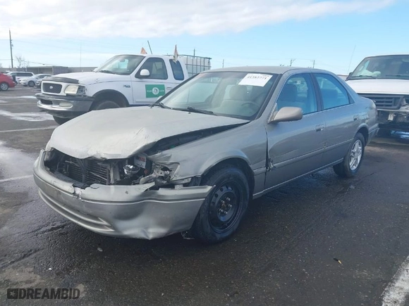 2001 Toyota Camry CE with VIN JT2BG22K510563344, listed as a IAAI auction lot 41582771 with 233,545 mi miles. Bid and sale history available at carsss.com. Image 2.