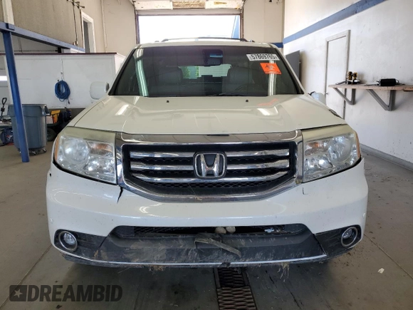 2014 Honda Pilot Touring z VIN 5FNYF4H99EB011079, wystawiony jako Copart lot #57869765 z przebiegiem Nie podano mil oraz Szkoda całkowita • Salvage title. Historia ofert i sprzedaży dostępna na DreamBid. Obrazek 5.