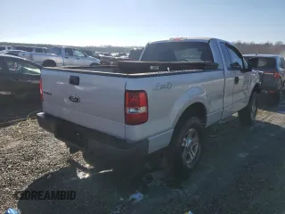 2005 Ford F-150 XL with VIN 1FTRF14535NB98598, listed as a Copart auction lot 88928675 with 214,304 mi miles and Salvage Title. Bid and sale history available at carsss.com. Image 3.