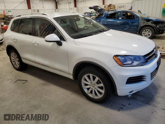 2012 Volkswagen Touareg Exec with VIN WVGEF9BP4CD011823, listed as a Copart auction lot 84063034 with 110,694 mi miles and Non Repairable. Bid and sale history available at DreamBid. Image 4.
