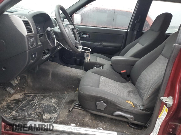 2009 GMC Canyon SLE1 with VIN 1GTCS139498113374, listed as a Copart auction lot 45015005 with 205,967 mi miles and Salvage Title. Bid and sale history available at carsss.com. Image 7.