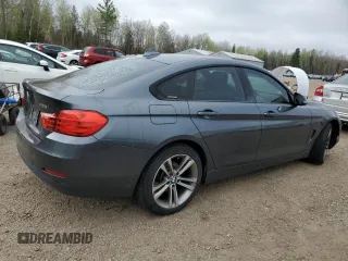2015 BMW 4 Series 428i xDrive with VIN WBA4A7C5XFD413329, listed as a Copart auction lot 56034905 with 167,816 mi miles and Clean title. Bid and sale history available at DreamBid. Image 3.
