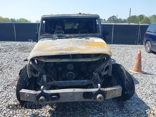 2011 Jeep Wrangler Unlimited Sport z VIN 1J4BZ3H17BL638996, wystawiony jako IAAI lot #41936385 z przebiegiem Nie podano mil oraz . Historia ofert i sprzedaży dostępna na DreamBid. Obrazek 15.