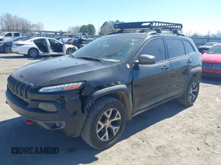 2015 Jeep Cherokee Trailhawk with VIN 1C4PJMBS5FW577470, listed as a IAAI auction lot 41565837 with 191,105 mi miles. Bid and sale history available at carsss.com. Image 17.