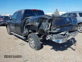 2005 Nissan Titan XE with VIN 1N6BA06A15N560400, listed as a IAAI auction lot 41656560 with 212,568 mi miles. Bid and sale history available at carsss.com. Image 3.