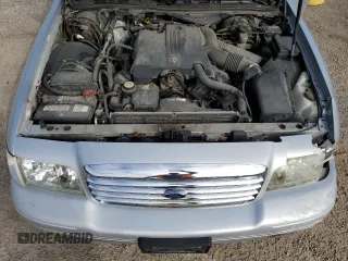2003 Ford Crown Victoria LX z VIN 2FAFP74W03X122995, wystawiony jako Copart lot #55774415 z przebiegiem 234 485 mil mil oraz Czysty tytuł • Clean title. Historia ofert i sprzedaży dostępna na DreamBid. Obrazek 11.