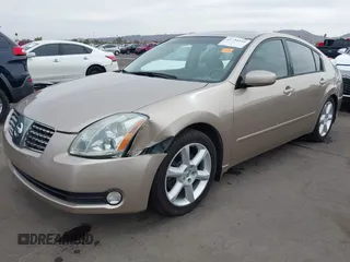 2004 Nissan Maxima SE with VIN 1N4BA41EX4C927086, listed as a IAAI auction lot 41734539 with 135,331 mi miles and . Bid and sale history available at DreamBid. Image 2.