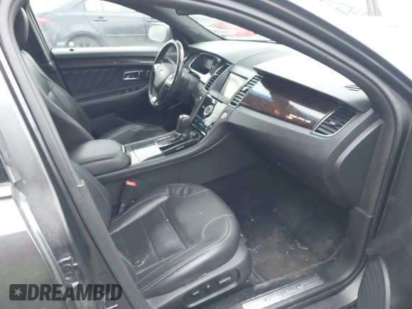 2015 Ford Taurus Limited with VIN 1FAHP2J88FG153326, listed as a IAAI auction lot 41465344 with 98,727 mi miles. Bid and sale history available at carsss.com. Image 5.