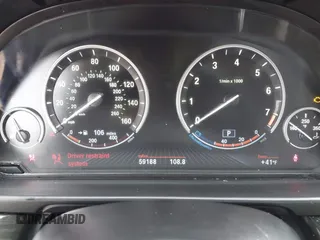 2013 BMW 5 Series 528i xDrive with VIN WBAXH5C50DDW15574, listed as a IAAI auction lot 41572993 with 59,188 mi miles. Bid and sale history available at carsss.com. Image 7.