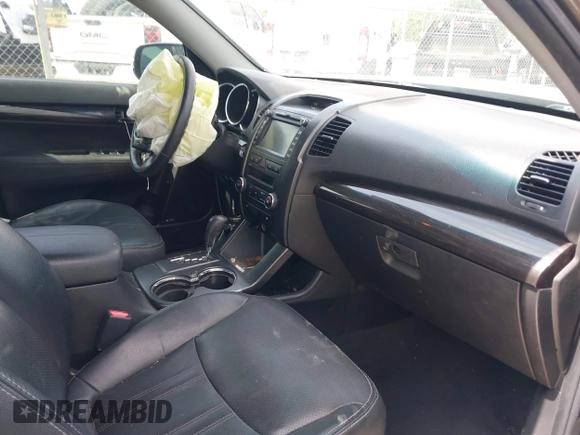 2012 Kia Sorento EX with VIN 5XYKU4A69CG276943, listed as a IAAI auction lot 42604286 with 182,425 mi miles and . Bid and sale history available at DreamBid. Image 5.