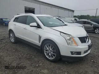 2013 Cadillac SRX Performance Collection with VIN 3GYFNHE34DS597871, listed as a Copart auction lot 56470795 with 208,504 mi miles and Salvage title. Bid and sale history available at DreamBid. Image 4.