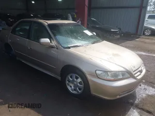 2001 Honda Accord EX z VIN 1HGCG66841A084703, wystawiony jako IAAI lot #41674373 z przebiegiem 143 814 mil mil oraz . Historia ofert i sprzedaży dostępna na DreamBid. Obrazek 1.