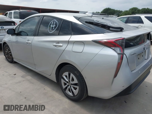2016 Toyota Prius Four z VIN JTDKARFU5G3008768, wystawiony jako IAAI lot #42125504 z przebiegiem 164 229 mil mil oraz . Historia ofert i sprzedaży dostępna na DreamBid. Obrazek 3.